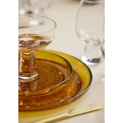 Kusintha Glastallerken